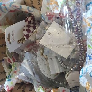 Box of not so mystery jewelry + other items